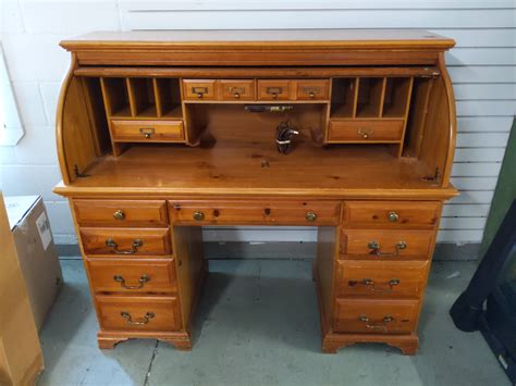 I think its oak. . Used roll top desk for sale